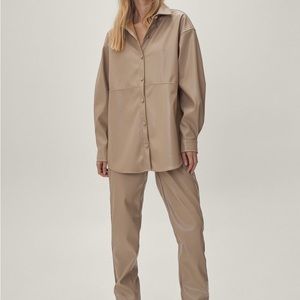 Two piece faux leather and features an oversized silhouette size 0 taupe color